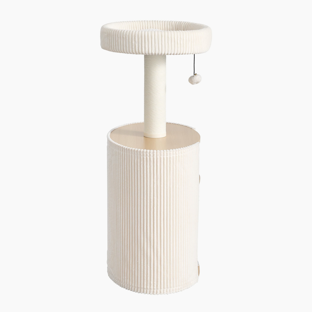 Nest Side in Cream, side view with ribbed fabric base and hanging pom-pom toy